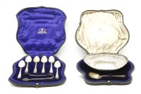Lot 53 - Two cased silver items: a basket and shell bowl spoon