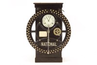 Lot 595 - An early 20th century National Time Recorder Co Ltd clocking in clock