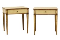 Lot 615 - A pair of French cream painted and parcel gilt lamp tables