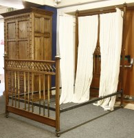 Lot 480 - An Edwardian mahogany and brass half tester double bedstead