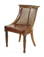 Lot 566 - A Regency bergère library chair