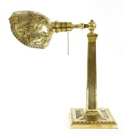 Lot 634 - A Victorian polished brass table lamp