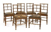 Lot 476 - A set of six oak dining chairs