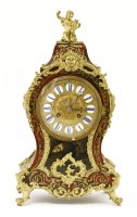 Lot 447 - A boullework mantel clock