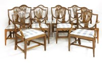 Lot 570 - A set of ten Hepplewhite mahogany dining chairs