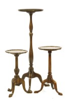 Lot 664 - Three 19th century mahogany tripod stands table