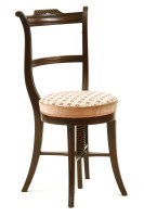 Lot 560 - A Victorian mahogany music chair