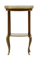 Lot 589 - A mahogany gilt mounted occasional table