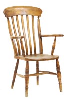 Lot 535 - A country made lath backed armchair with solid seat and legs