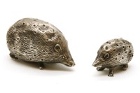 Lot 64 - Two silver hedgehog pin cushions