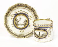 Lot 299 - A Nymphenburg porcelain coffee can and saucer