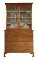 Lot 583 - A George III mahogany secretaire bookcase