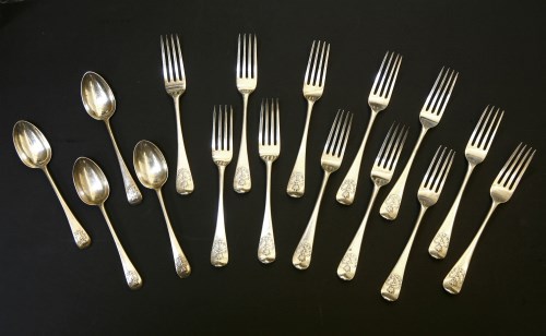 Lot 66 - Twelve silver table forks and four dessert spoons