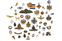 Lot 78 - A collection of World War ll era cap badges: The Essex Regiment; Royal Marines