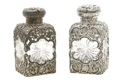 Lot 116 - A pair of silver mounted scent bottles
