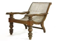 Lot 505 - A teak planters chair