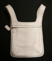 Lot 1180 - A Coach white leather slim flat 'Hippie' backpack