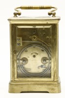Lot 124 - A brass carriage clock