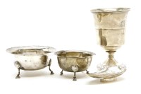 Lot 104 - A George III silver goblet and three dishes