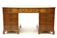 Lot 483 - An early 20th century pedestal desk