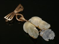Lot 161 - An Asian carved aquamarine pendant/brooch