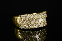 Lot 260 - A Portuguese diamond set gold band ring