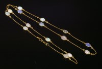 Lot 215 - An opal set gold chain