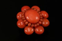 Lot 483 - A coral cluster brooch
