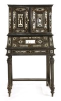 Lot 640 - A Continental ivory inlaid bureau cabinet