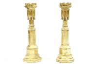 Lot 571 - A pair of modern and gilt pricket stands