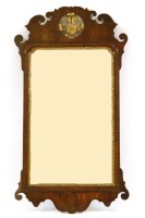 Lot 474 - A George III walnut and parcel gilt pier mirror