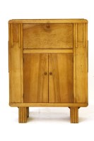 Lot 594 - An Art Deco walnut cocktail cabinet