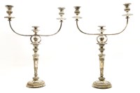 Lot 318 - A pair of Victorian silver plated twin branch candelabra