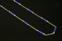 Lot 216 - A gold lapis lazuli baton link chain