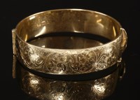 Lot 185 - A 'D' section hinged bangle