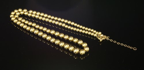 Lot 74 - A late Victorian graduated gold bead necklace