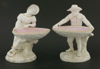 Lot 171 - A pair of Royal Worcester figural bonbon dishes