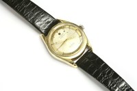 Lot 57 - A gentlemen's gold plated Universal Geneve Polerouter Automatic Microtor strap watch
