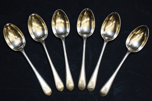 Lot 99 - A set of six silver teaspoons by Walker & Hall