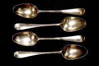 Lot 74 - Four early Georgian silver table spoons
