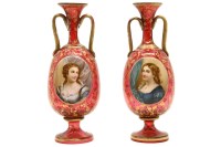 Lot 165 - A pair of bohemian red and gilt decorated glass portrait vases