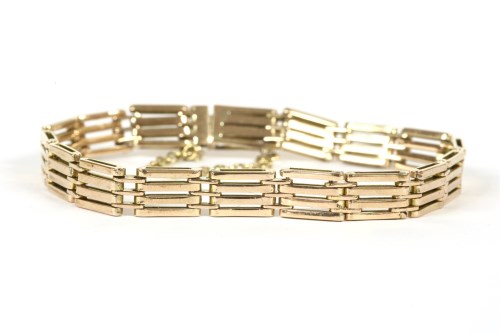 Lot 30 - A gold four row gate-link bracelet