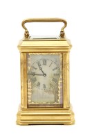 Lot 128 - A miniature carriage clock