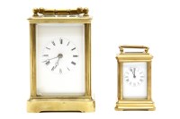 Lot 123 - A striking brass carriage clock