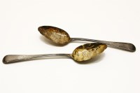 Lot 82 - A pair of George III silver berry spoons