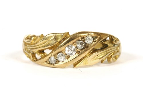 Lot 13 - An 18ct gold five stone diamond ring