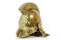 Lot 156 - A brass fire helmet from the H.H Fire Brigade