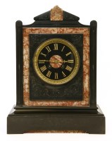 Lot 176 - A Victorian black and rouge marble mantle clock