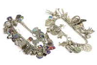 Lot 39 - Two silver curb link charm bracelets