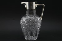 Lot 116 - A Mappin & Webb silver and hobnail cut glass claret jug